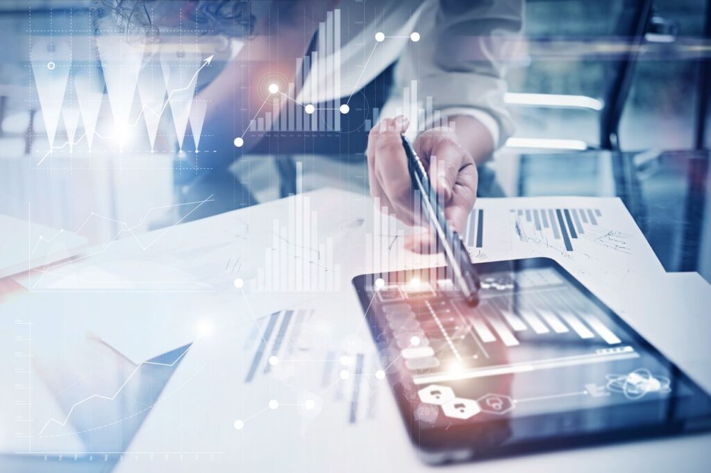 a tab on the desk showing some graphs